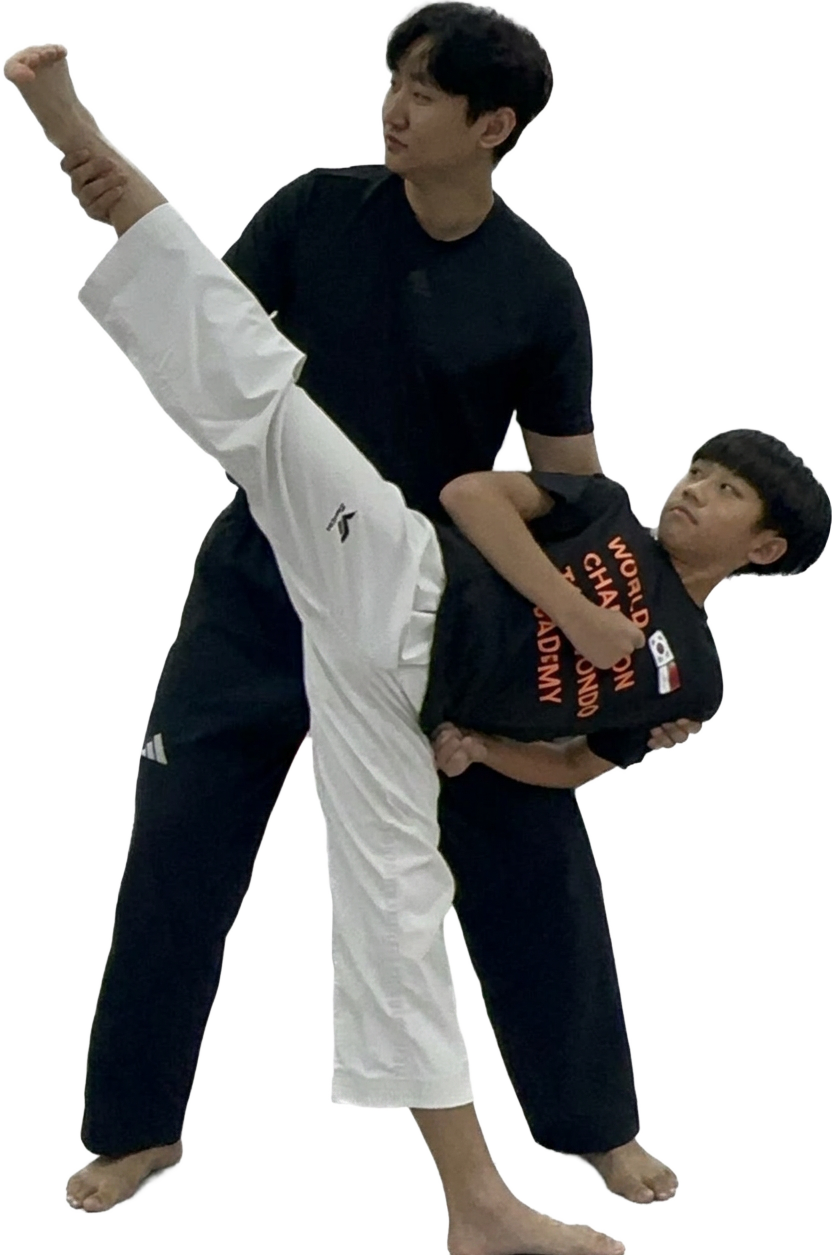 Head coach demonstrating high kick